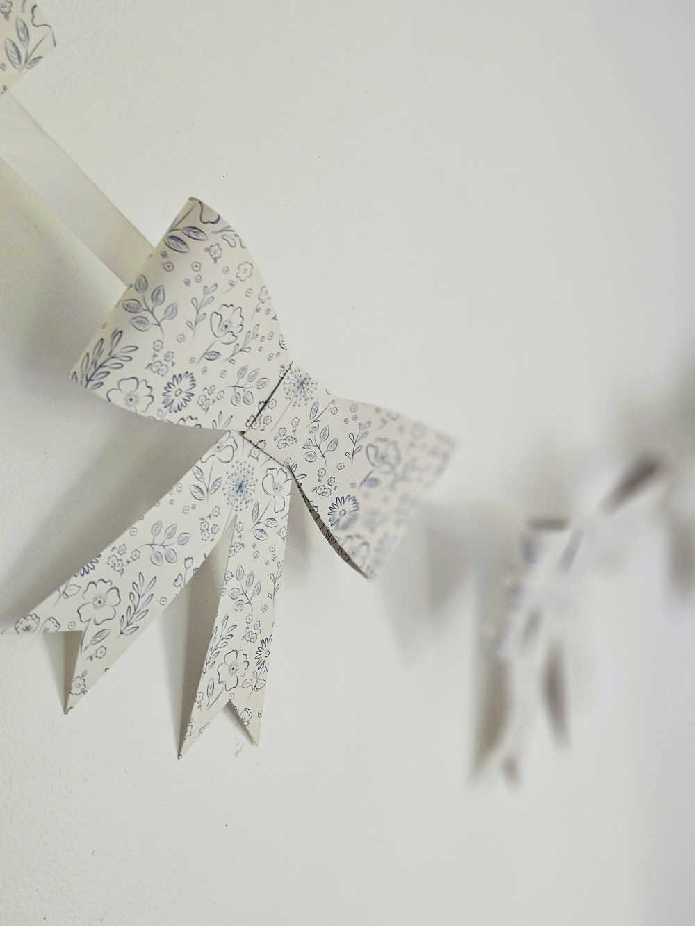 Paper Bow Garland with Blue Floral Design